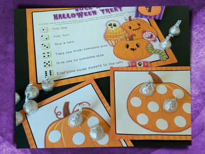 Halloween-themed candy game with pumpkins and candy on a purple background